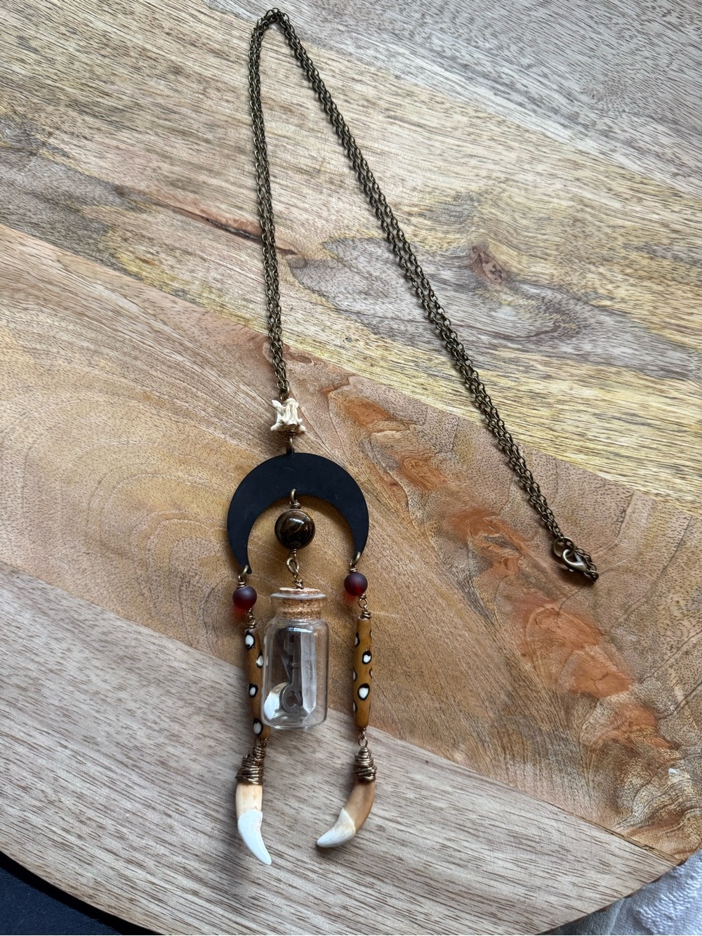 Bohemian Crescent Pendant Necklace in Black, Brown, and Cream